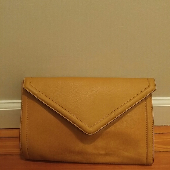 Isaac Mizrahi Handbags - NWT Isaac Mizrahi butterscotch clutch